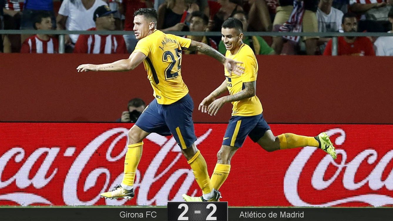 Foto: Los goles de Giménez y Correa dieron un punto al Atlético. (EFE)