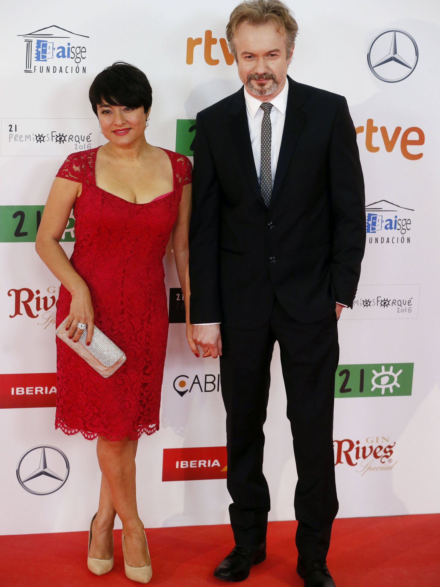 El actor con su mujer, Carolina Román. (EFE)