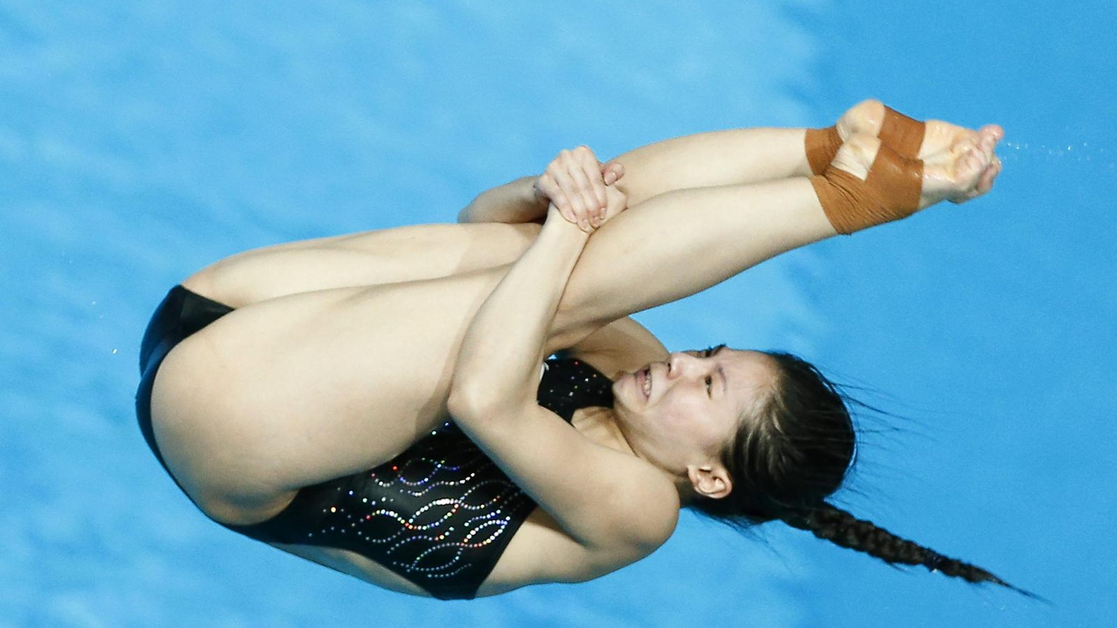 Foto: La nadadora Zi He durante un salto en los Mundiales de Kazán (EFE)