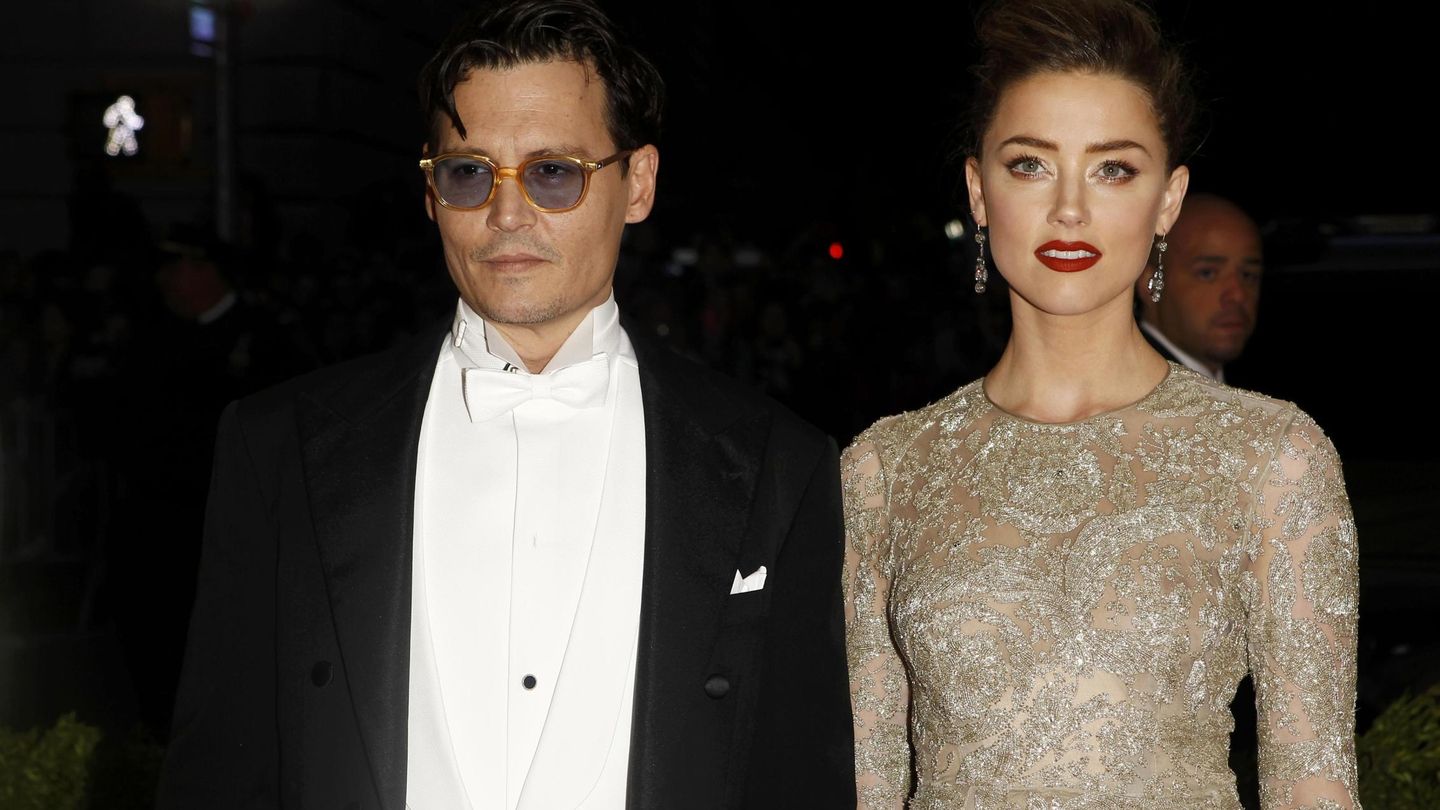 Johnny Depp y Amber Heard, en 2014.  (Reuters/Carlo Allegri)