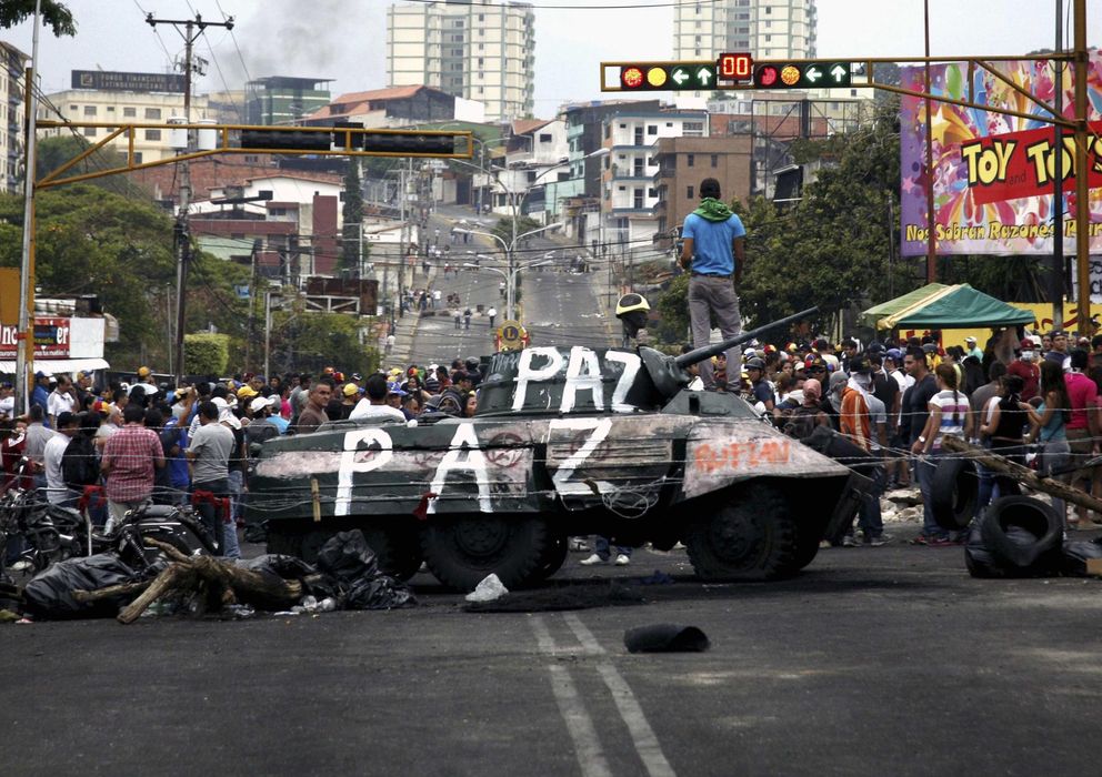 Foto: Opositores al Gobierno de Maduro durante una protesta en San Cristóbal, Venezuela (Reuters).