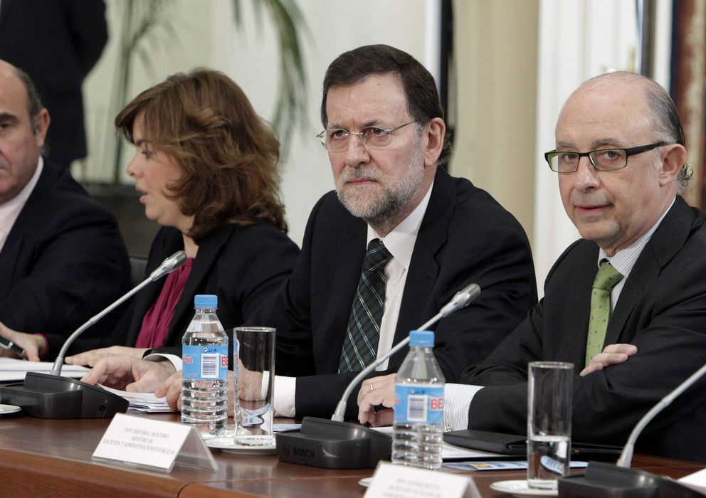 Foto: Luis de Guindos, Soraya Sáenz de Santamaría, Mariano Rajoy y Cristóbal Montoro. (Efe)