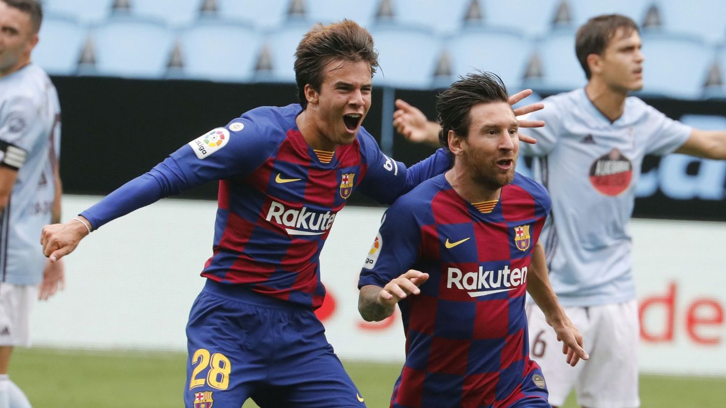Puig y Messi celebran un tanto la pasada temporada. (EFE)