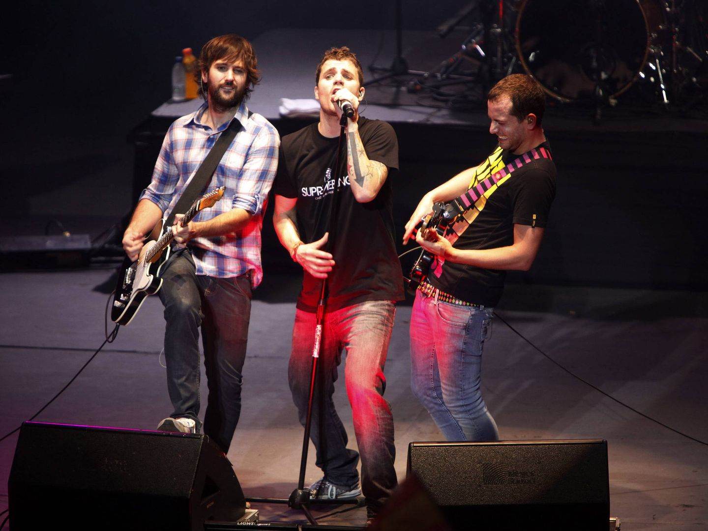 El grupo El Canto del Loco, durante un concierto en Caracas (Venezuela). (EFE/David Fernández)
