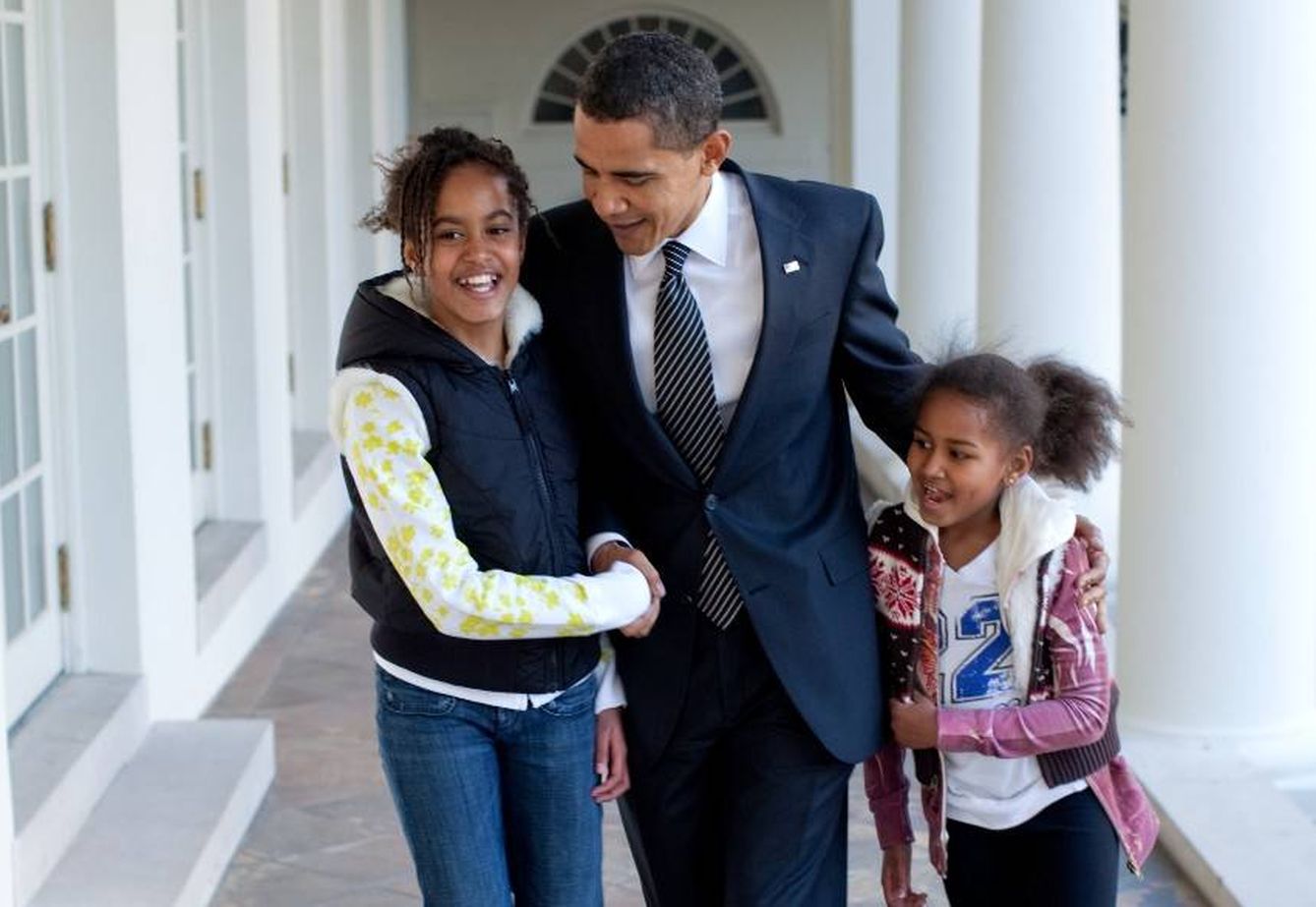 Obama y sus hijas.