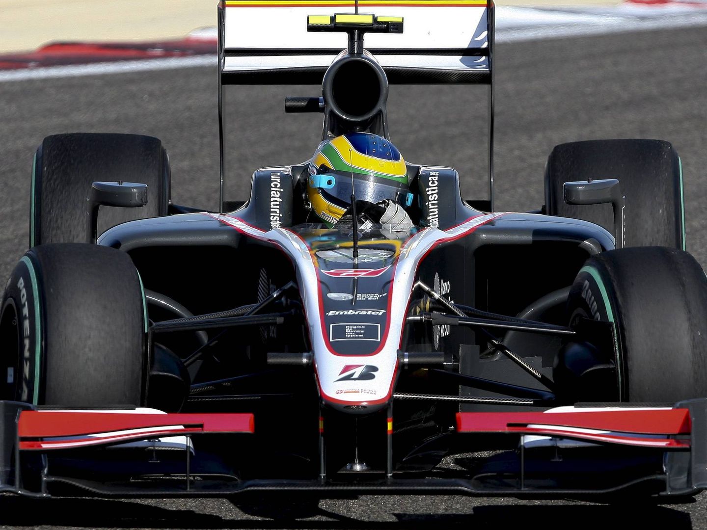 Bruno Senna y Karun Chandhok fueron los encargados de poner en pista al equipo español HRT. (EFE)