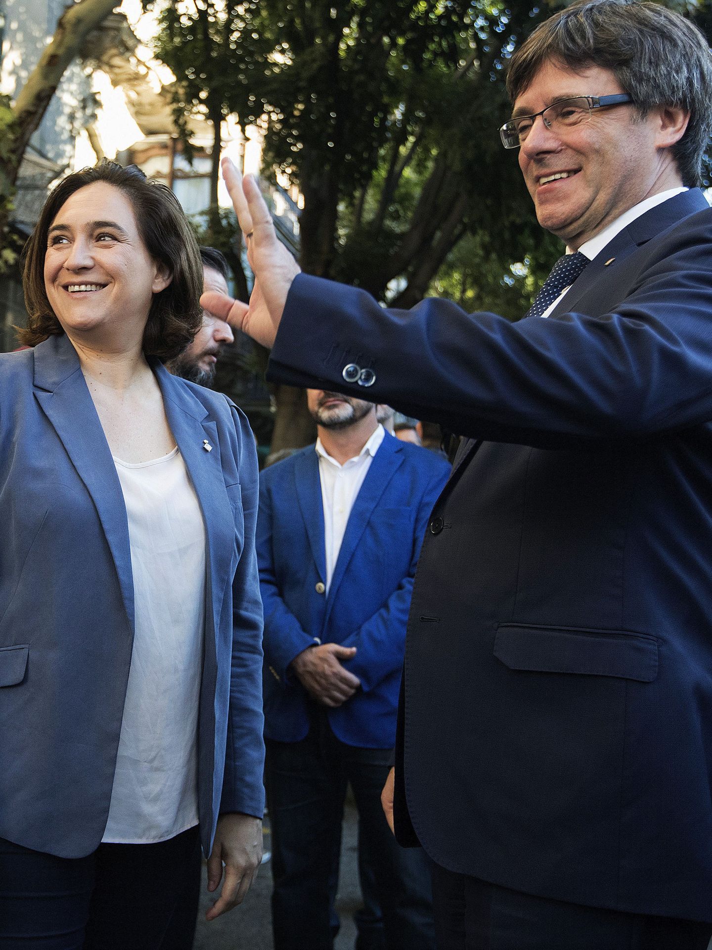 Carles Puigdemont y Ada Colau. (Efe)