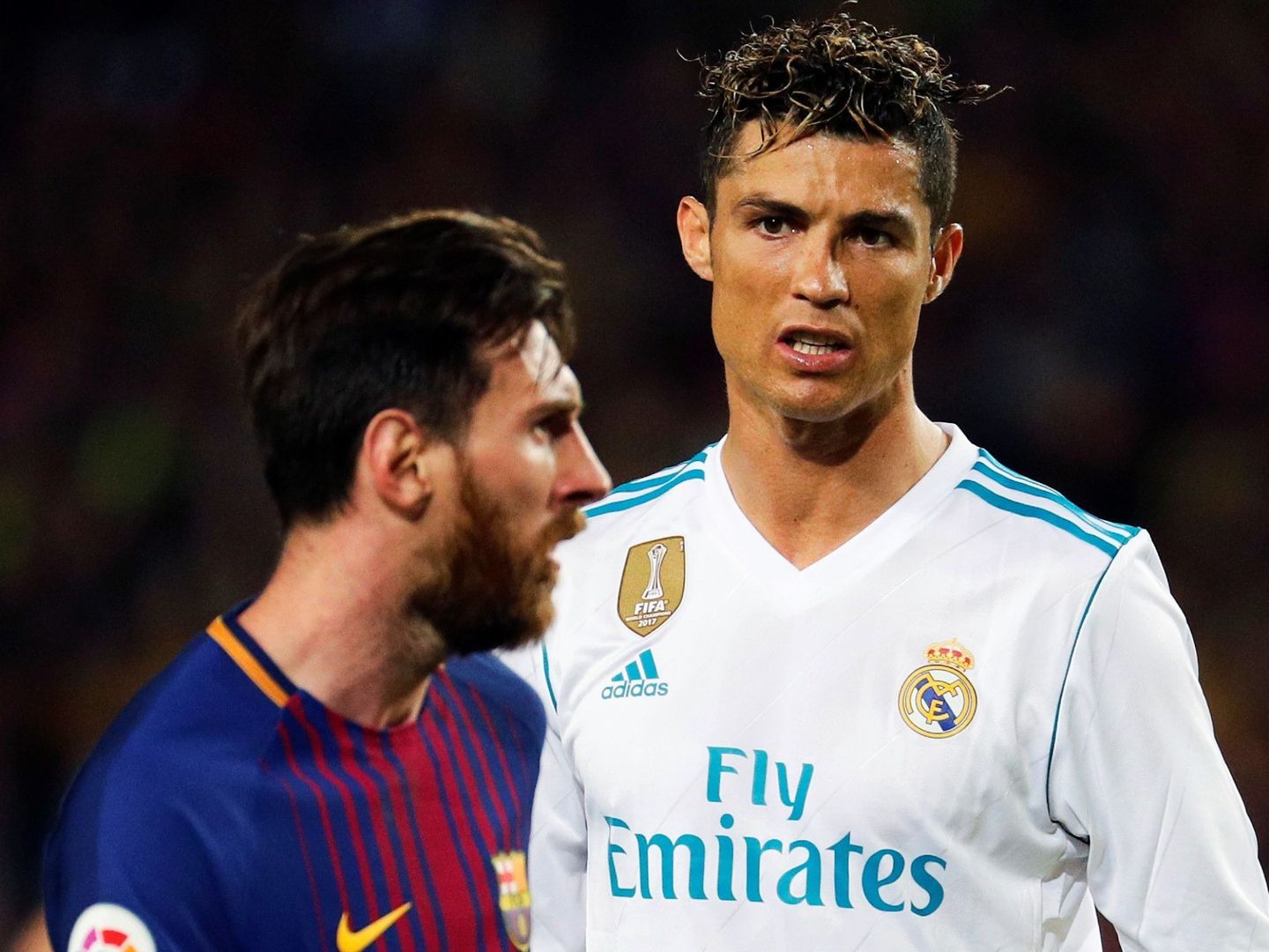 Cristiano y Messi, en un pasado duelo. (EFE)