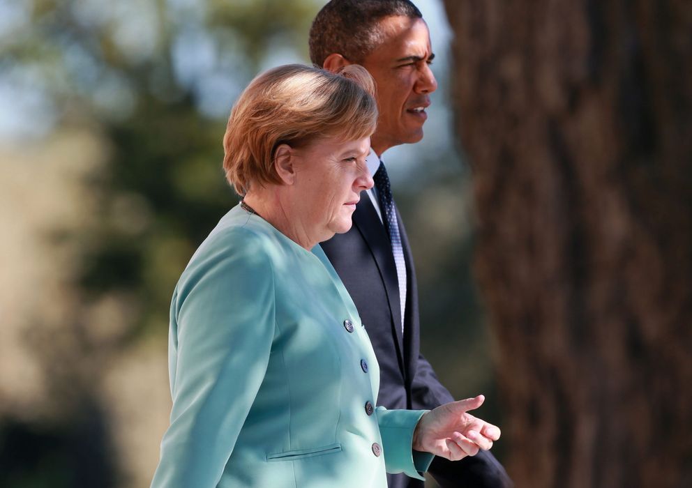 Foto: Obama (d) y la canciller alemana Angela Merkel (i) momentos antes de la foto de familia de los líderes del G20 (Efe).