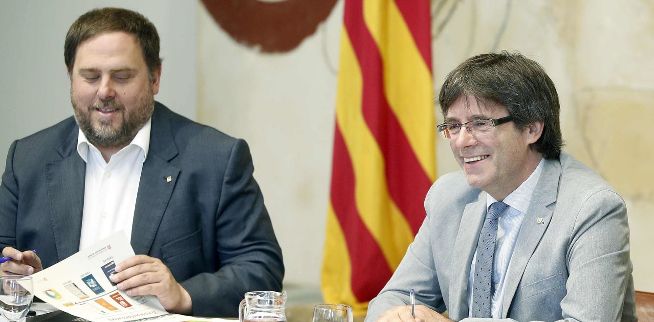 Carles Puigdemont y Oriol Junqueras. (EFE)