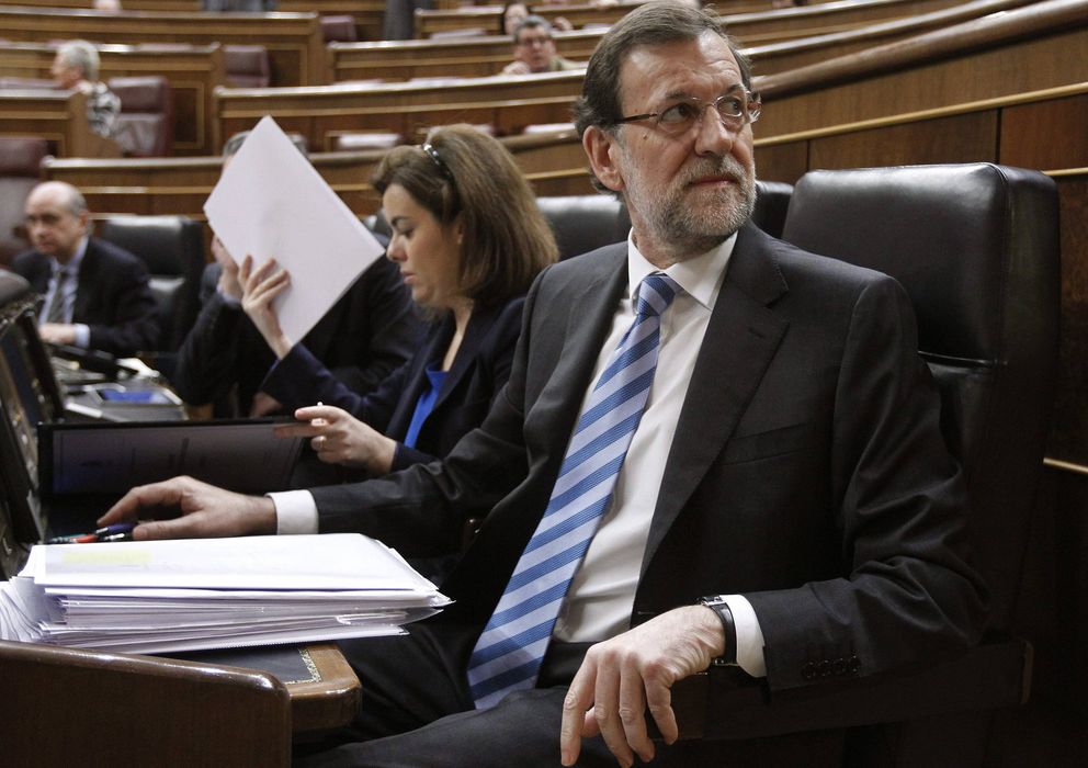 Foto: Mariano Rajoy y Soraya Sáenz de Santamaría, en el debate del estado de la nación en febrero de 2013. (EFE)