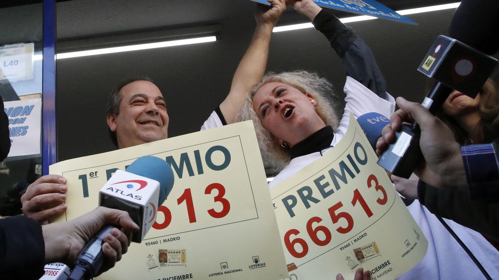 Foto: Los loteros de Madrid que han vendido el Gordo (EFE)