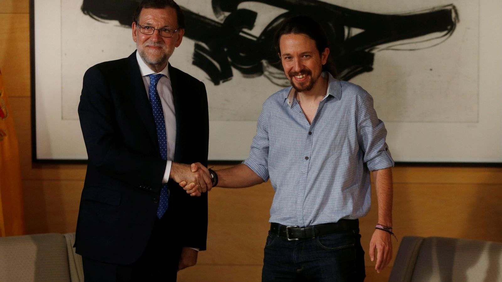 Foto: El presidente en funciones, Mariano Rajoy, junto al líder de Podemos, Pablo Iglesias. (Reuters)