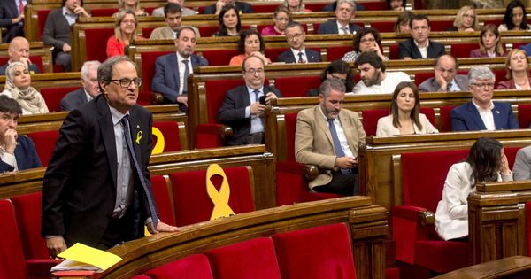 Foto:  El candidato de JxCAT a ser investido presidente de la Generalitat, Quim Torra, durante el pleno. (EFE)