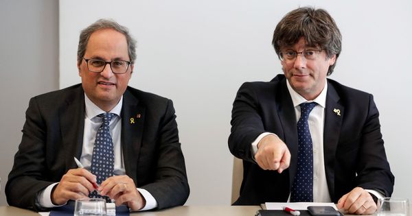 Foto: Quim Torra y Carles Puigdemont, en un acto de JxCAT en Bruselas. (EFE)