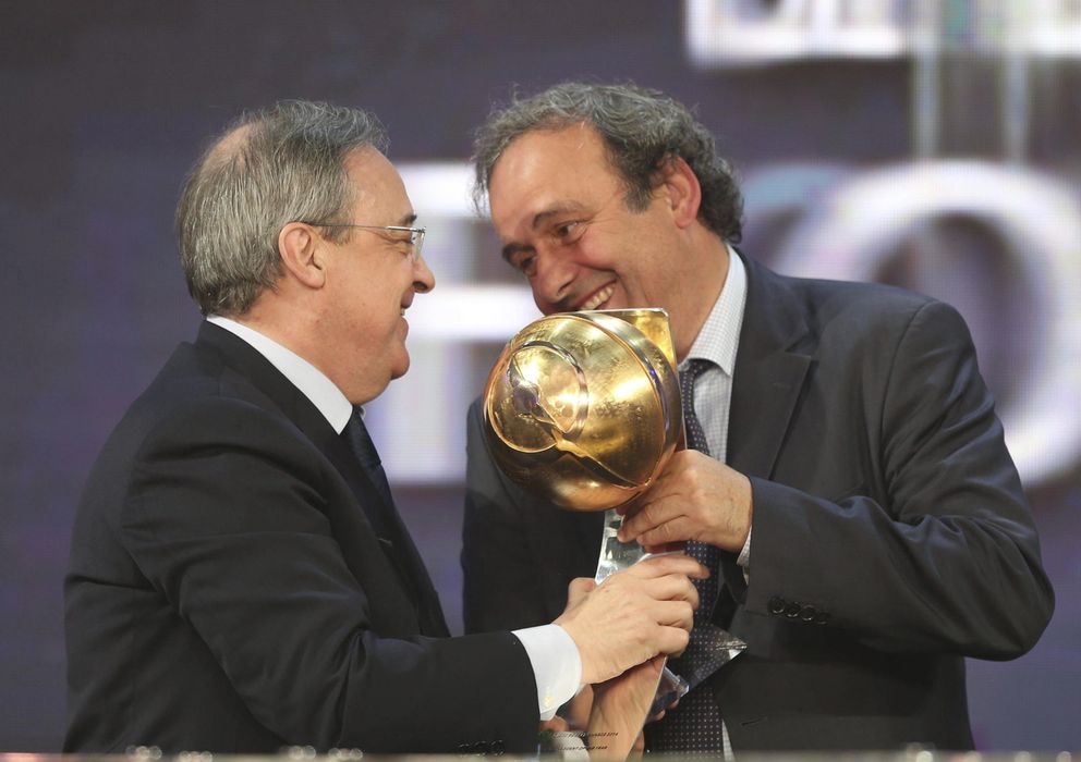 Foto: Florentino Pérez junto a Michel Platini tras ser galardonado en Dubái (Efe).