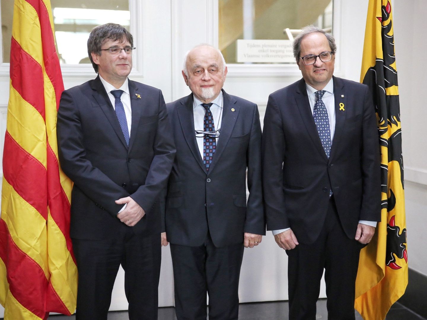 Puigdemont y Torra junto al presidente del parlamento flamenco. (EFE)