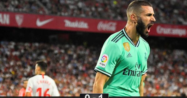 Foto: Benzema celebra el gol de cabeza al Sevilla en el Sánchez Pizjuán. (EFE)