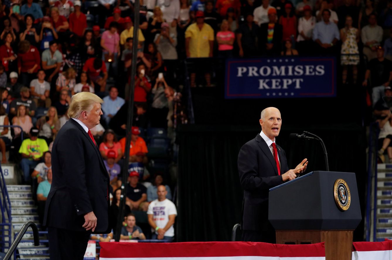 Rick Scott durante un mitin electoral junto a Donald Trump en Estero, Florida. (Reuters)