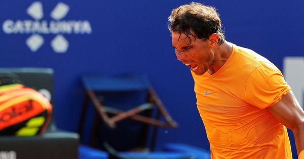 Foto: Rafa Nadal celebra con rabia su victoria ante Martin Klizan en los cuartos de final del Conde de Godó. (EFE)