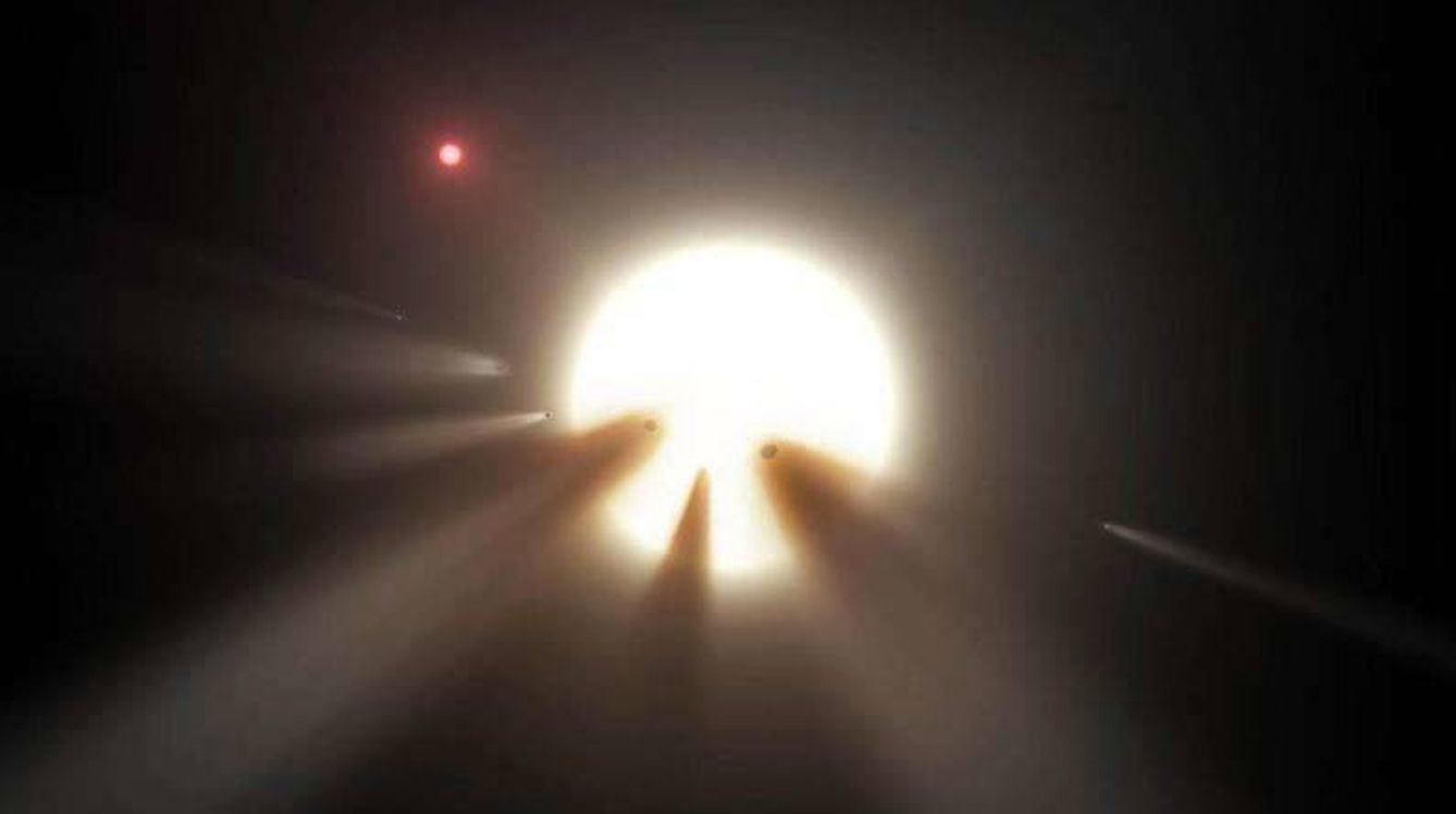Ilustración de un enjambre de cometas con colas polvorientas en torno a la misteriosa estrella (NASA)
