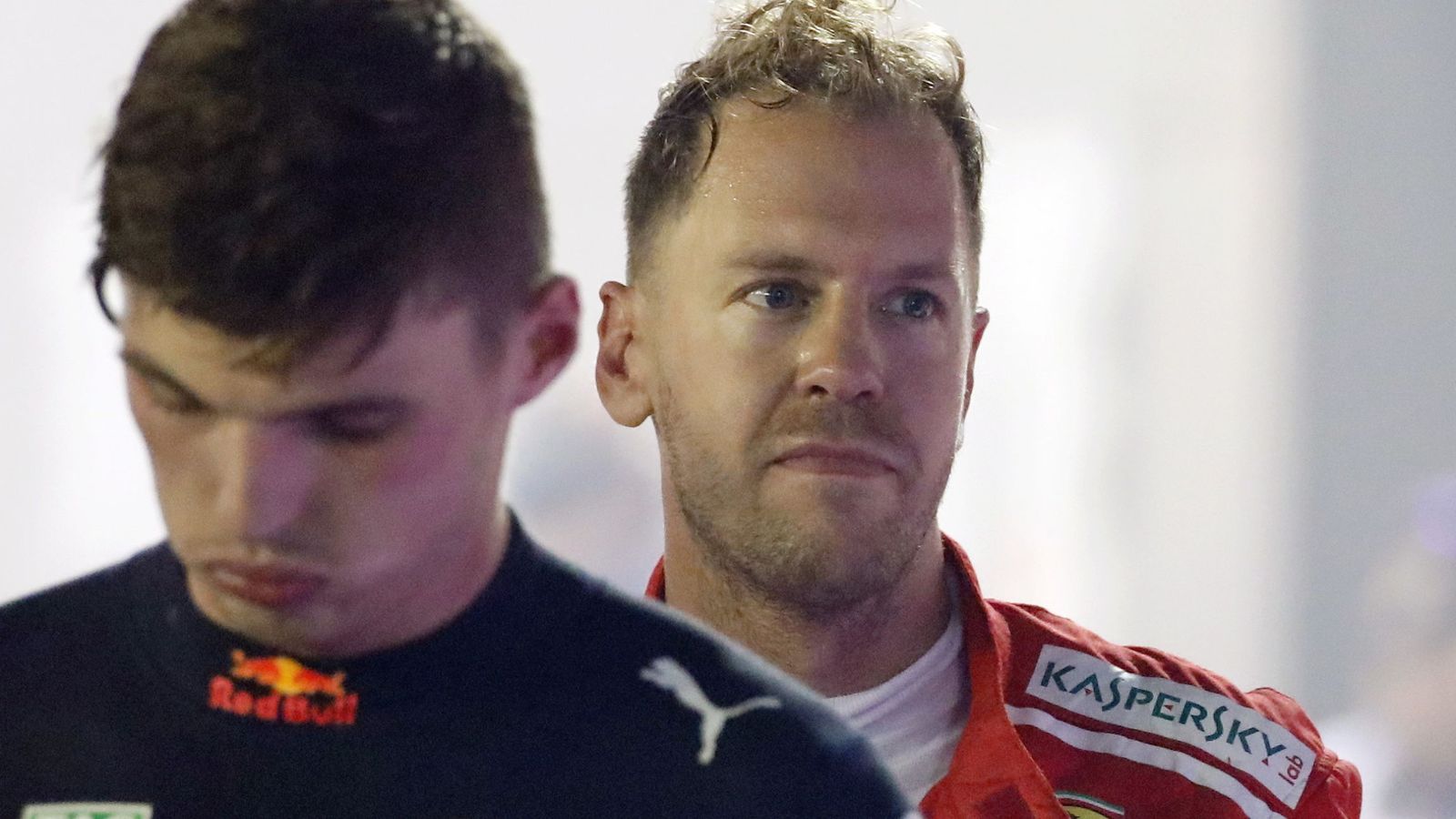 Foto: Verstappen y Vettel tras el GP de Singapur. (EFE)