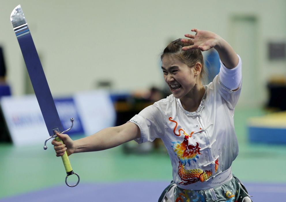 Foto: Tai Cheau Xuen, en un ejercicio durante los Juegos Asiáticos (EFE).