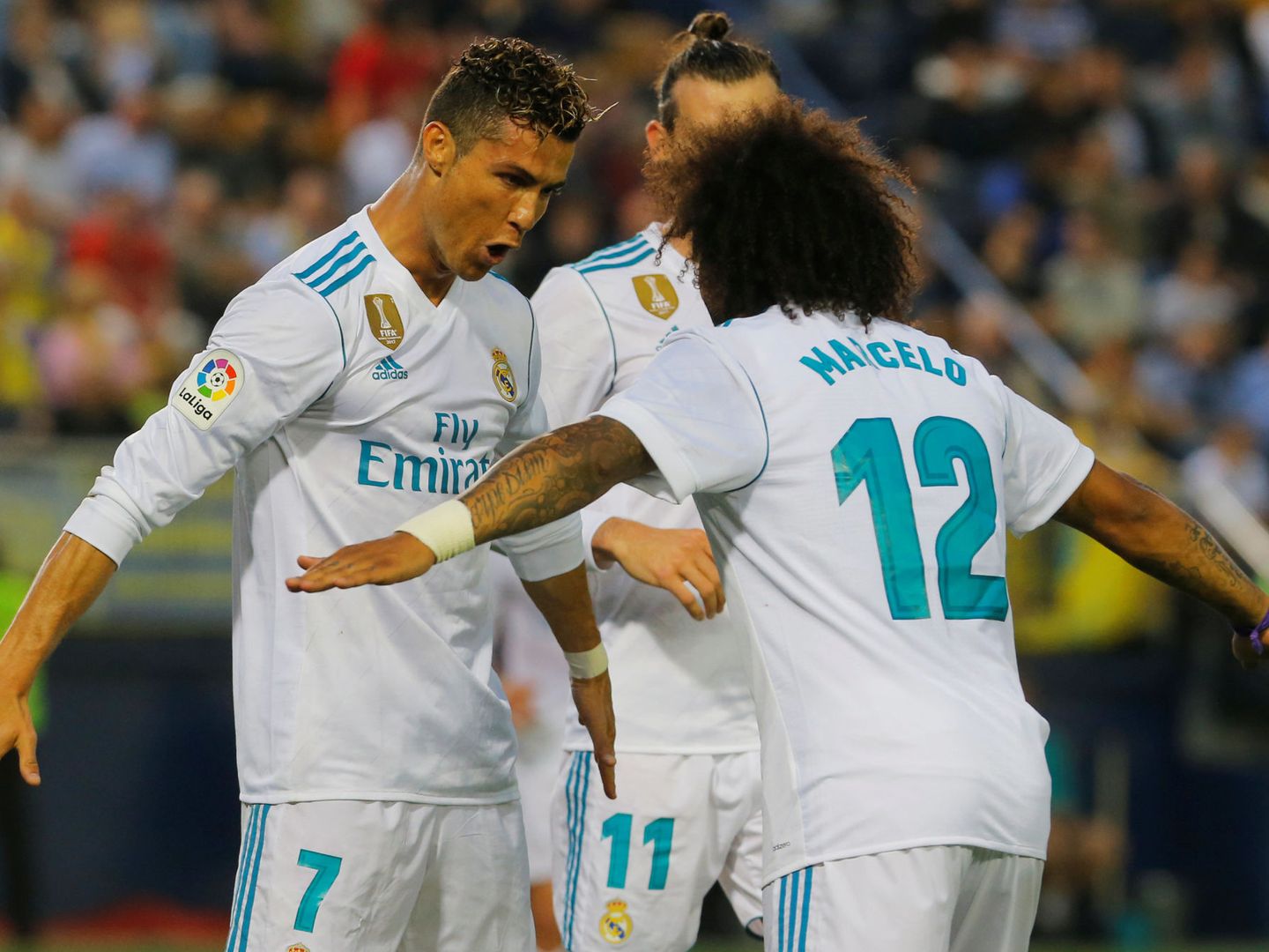Marcelo y su amigo Cristiano Ronaldo celebran un gol. (EFE) 