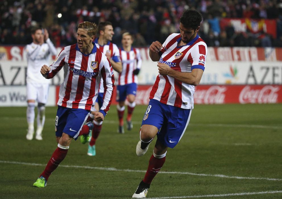 Foto: Raúl García y Torres celebran el gol del navarro al Madrid en Copa (Reuters).