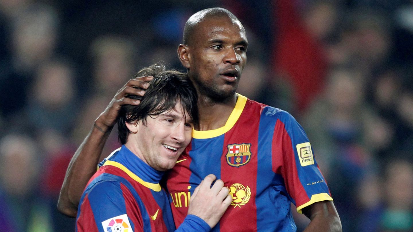 Éric Abidal y Leo Messi, en 2011. (Reuters)