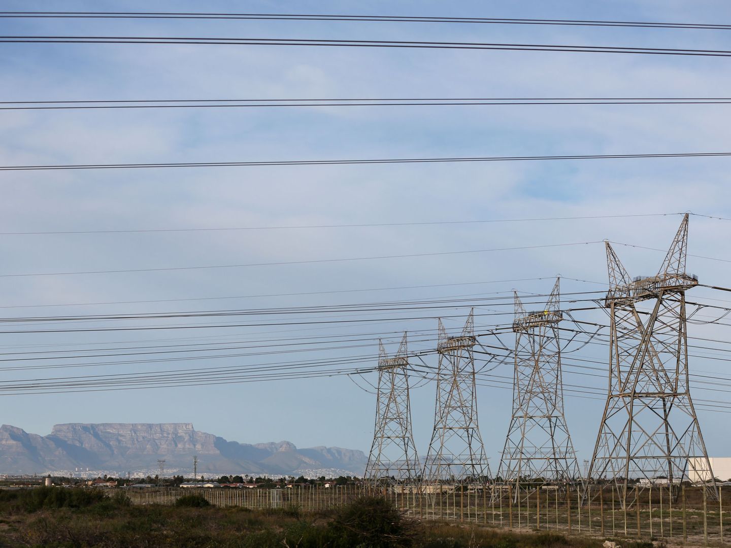 Electricity pylons carrying power from Koeberg nuclear power plant are seen in Cape Town, South Africa July 11, 2018. Picture taken July 11, 2018. REUTERS Sumaya Hisham