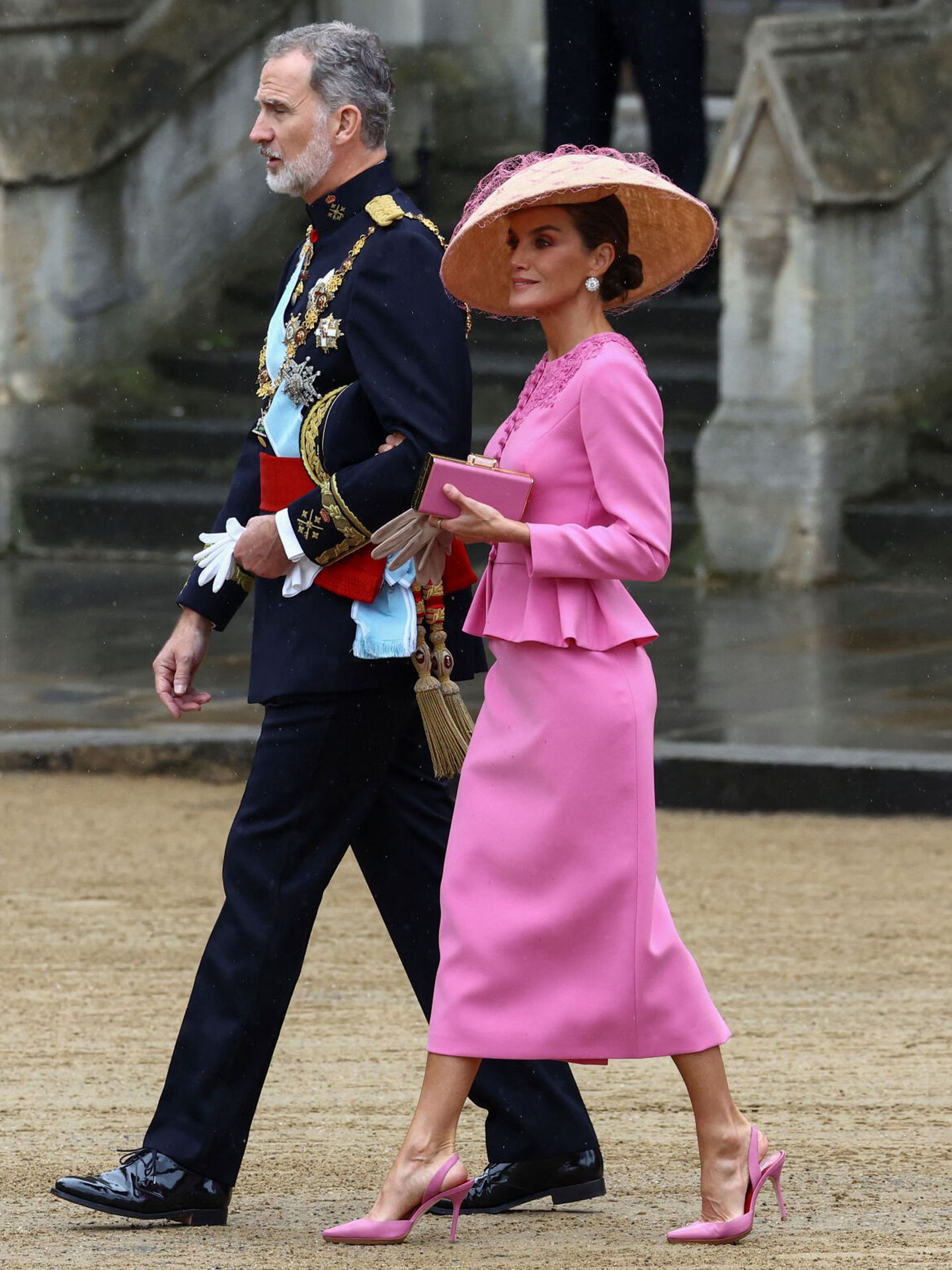 Spain's King Felipe and Queen Letizia walk outside Westminster Abbey ahead of Britain's King Charles' coronation ceremony, in London, Britain May 6, 2023. REUTERS Lisi Niesner