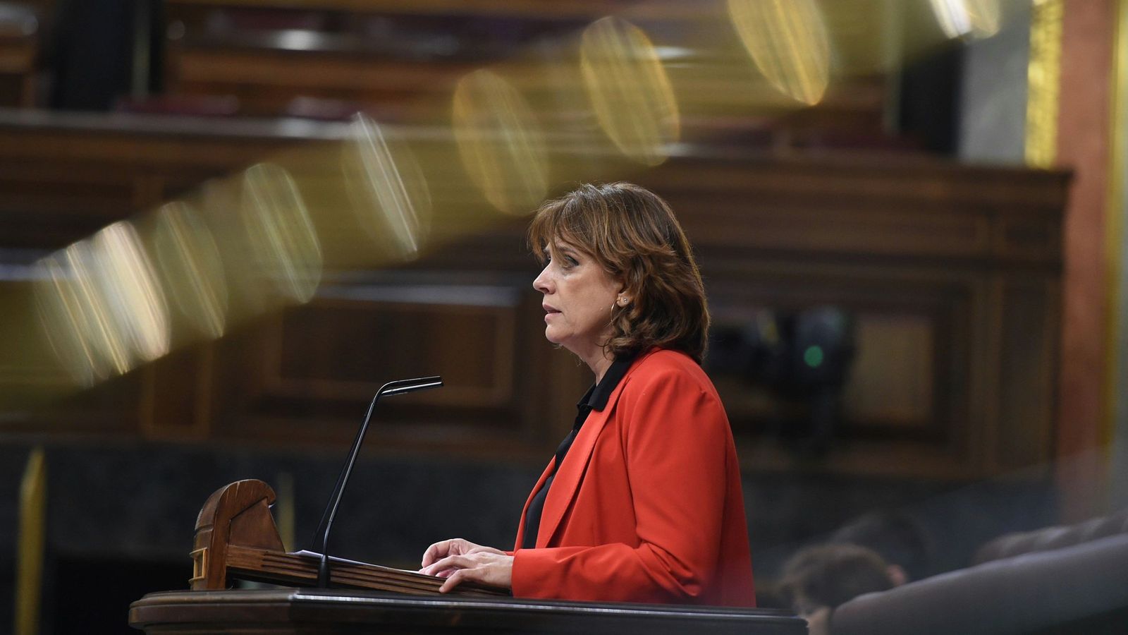 Foto: La ministra de Justicia, Dolores Delgado, durante su intervención en el pleno del Congreso de los Diputados. (EFE)