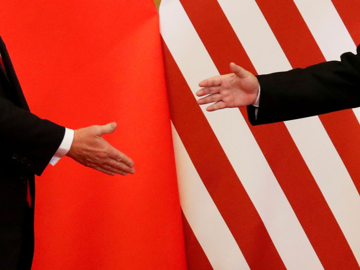 Foto: Donald Trump y Xi Jinping, segundos antes de darse la mano el 9 de noviembre de 2017. (Reuters)