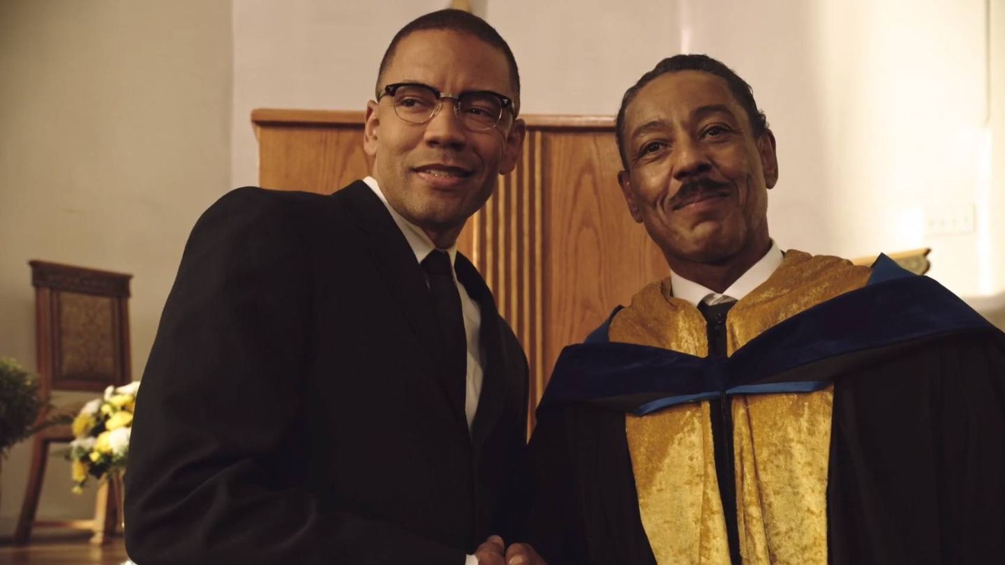 Nigel Thatch (Malcolm X) y Giancarlo Espósito (Reverendo Powell) en 'El Padrino de Harlem'. (HBO España)