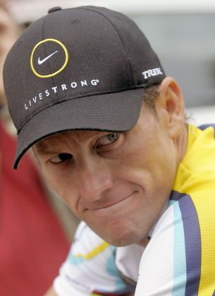 Lance armstrong settles with sunday times