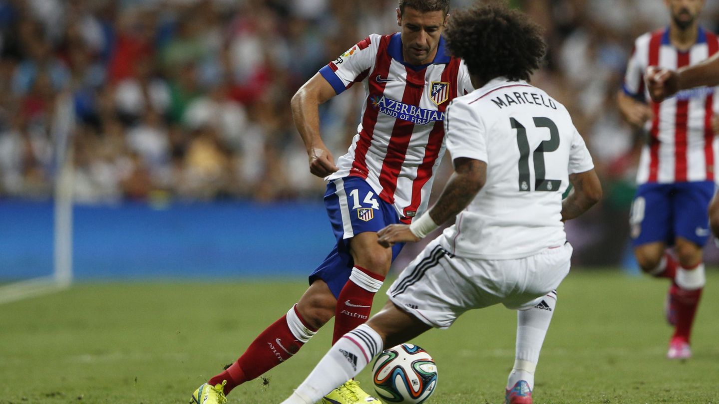 Marcelo defiende a Gabi en la final de la Champions. (Reuters) 