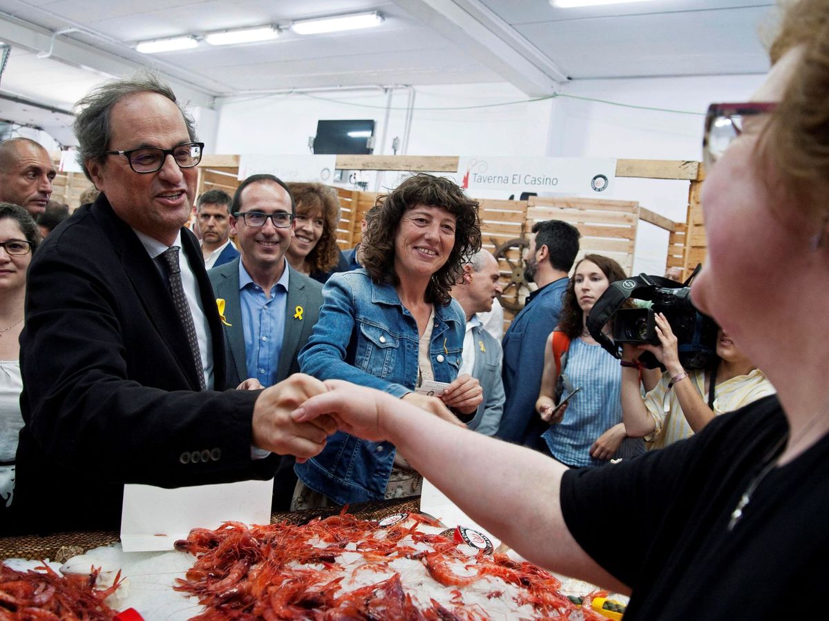 Foto: El entonces presdente de la Generalitat, Quim Torra, junto al alcalde Lluís Puig en Palamós, en una imagen de 2018. (EFE/Robin Townsend)