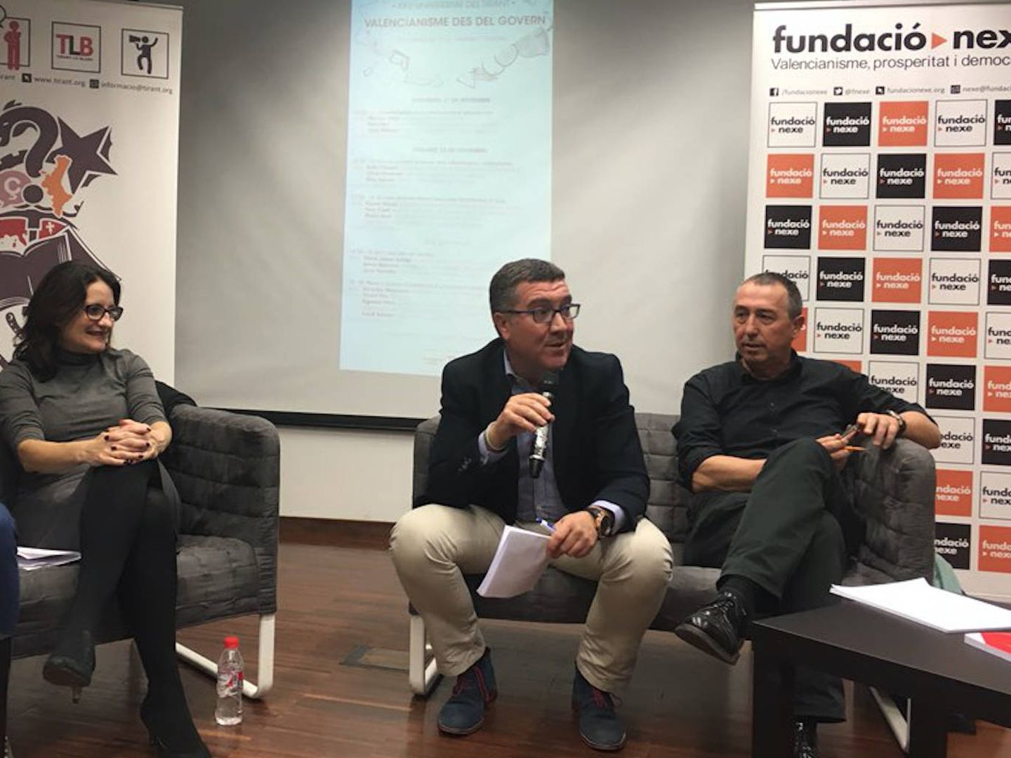 El secretario autonómico de Justicia, Ferran Puchades, (c), en un acto con Oltra y Baldoví. (Compromís)