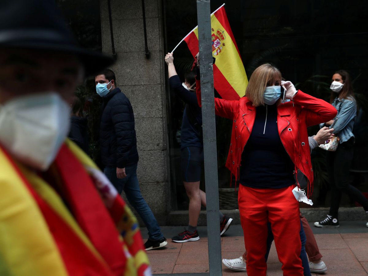 Foto: Una mujer protesta en Madrid. (Reuters)