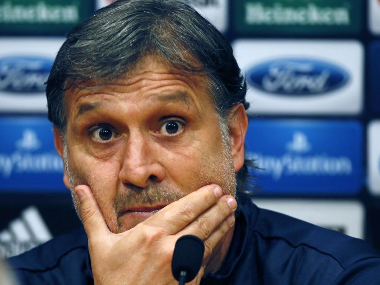 Barcelona's coach gerardo 'tata' martino attends a news conference at nou camp stadium in barcelona