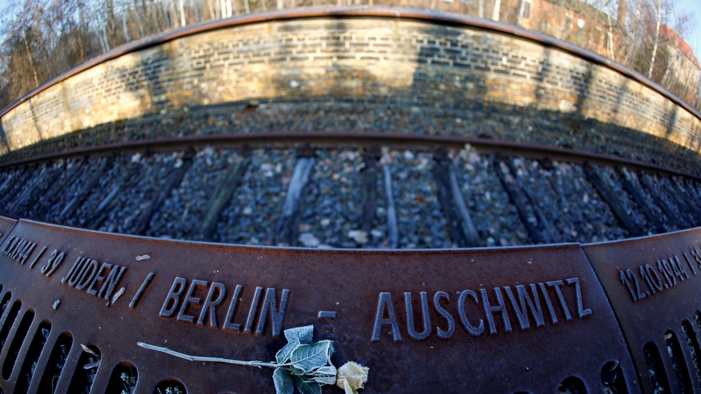 A frozen rose is seen next to the word 'Auschwitz' at the Gleis 17 (Platform 17) memorial, a platform at Berlin-Grunewald train station from where some 50,000 Jewish citizens were deported by train to the Nazi concentration camps between 1941 and 1945, in Berlin, Germany, January 24, 2020.    Picture taken with a fish-eye lens.  REUTERS Fabrizio Bensch     TPX IMAGES OF THE DAY