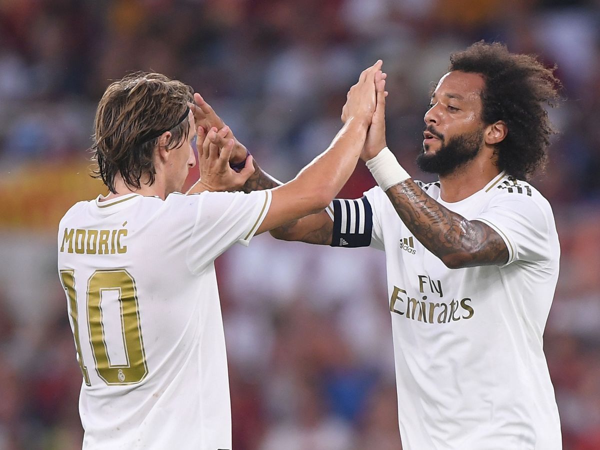 Foto: Luka Modric y Marcelo Vieira celebran un gol en un partido del Real Madrid (REUTERS/Lingria)