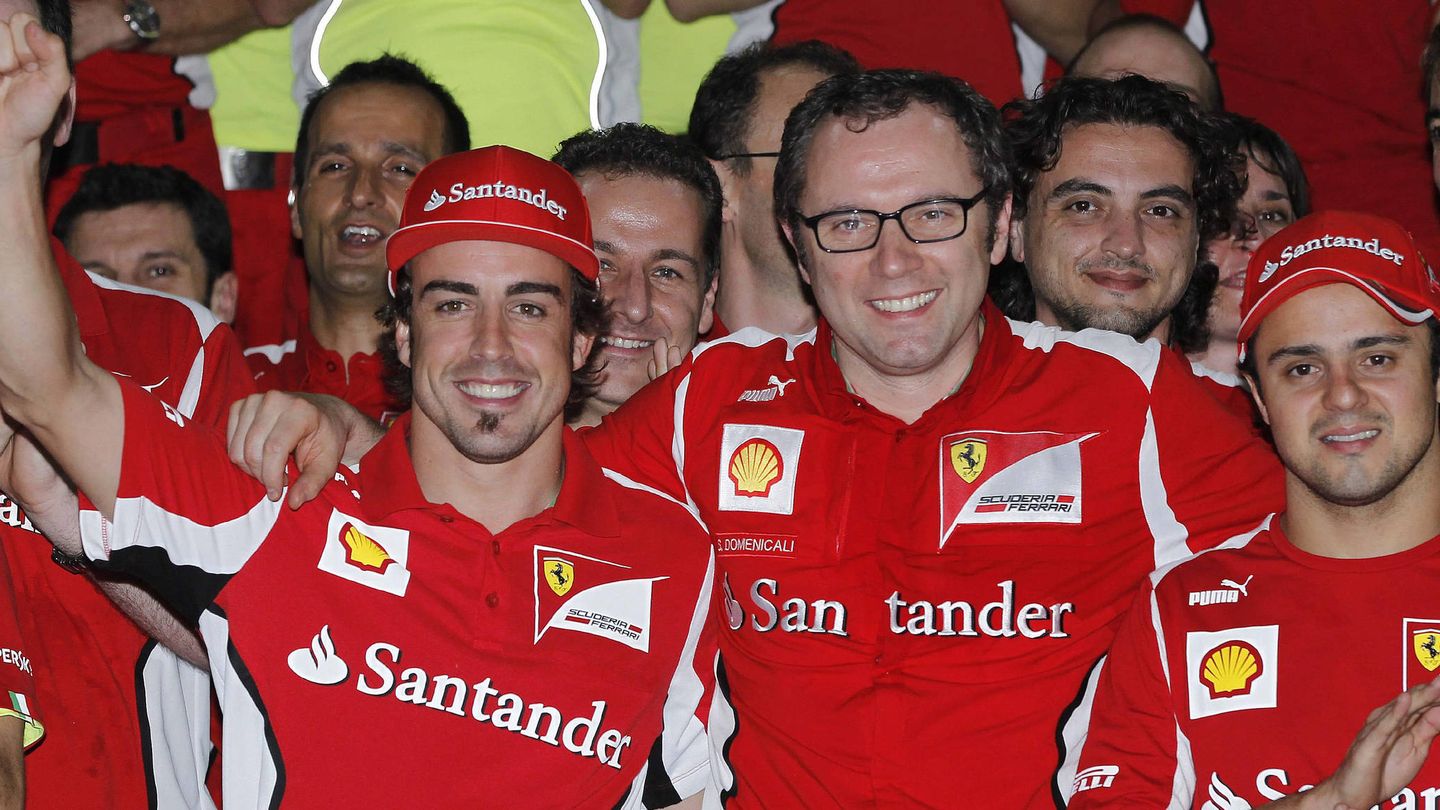 Alonso y Domenicali, durante su etapa en Ferrari. (EFE/Ahmad Yusni)
