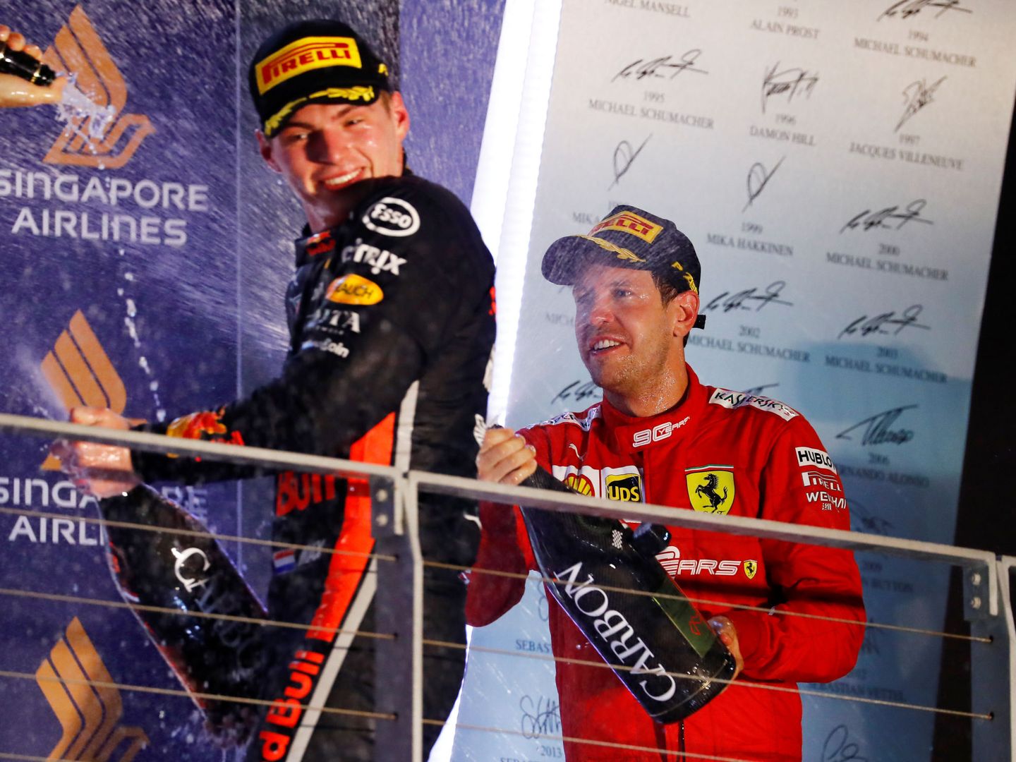 Vettel y Verstappen podrían compartir equipo en 2021. (Reuters)