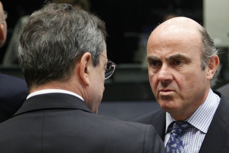 Mario Draghi y Luis de Guindos. (Reuters)