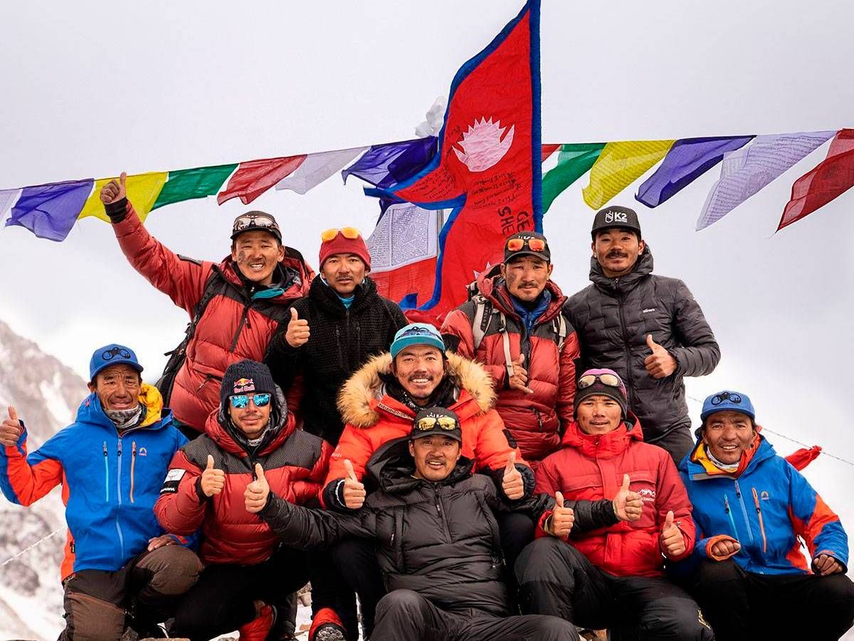 Foto: El equipo 'sherpa' celebra su histórico logro. (Reuters)