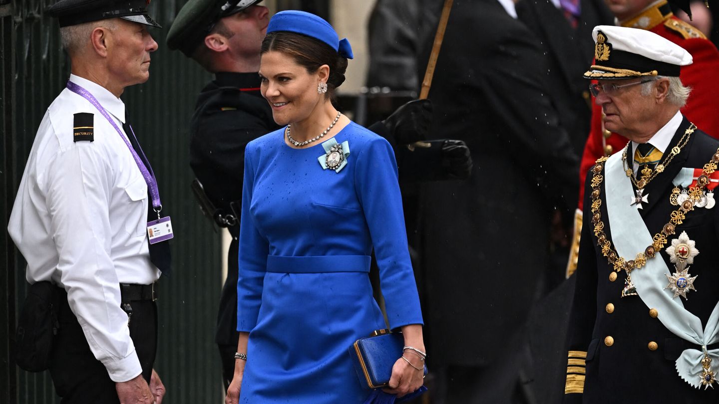 Sweden's King Carl XVI Gustaf and Crown Princess Victoria walk outside Westminster Abbey ahead of Britain's King Charles' coronation ceremony, in London, Britain May 6, 2023. REUTERS Dylan Martinez
