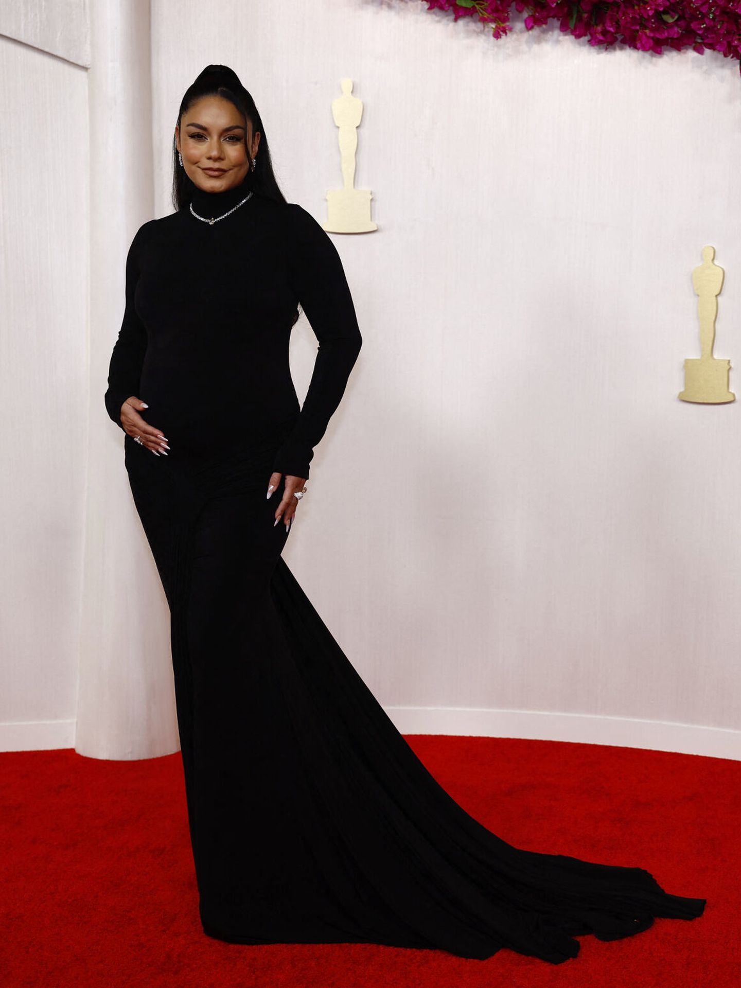 Vanessa Hudgens, who is pregnant, poses on the red carpet during the Oscars arrivals at the 96th Academy Awards in Hollywood, Los Angeles, California, U.S., March 10, 2024. REUTERS Sarah Meyssonnier