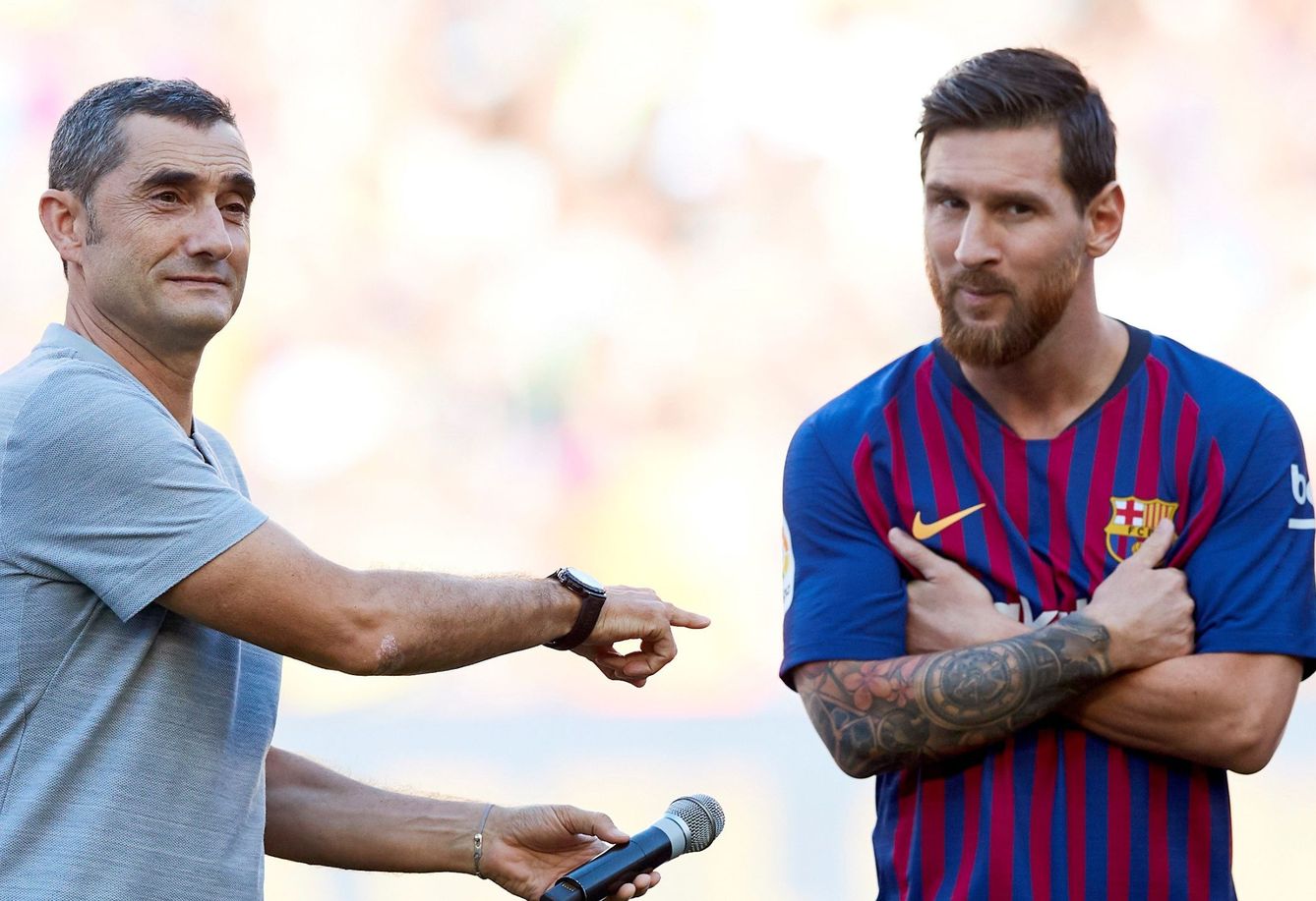 Ernesto Valverde y Leo Messi, en la pretemporada de agosto de 2018. (EFE)